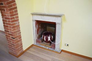 Appartamento Pietrasantese : Fireplace