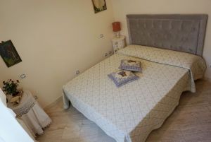 Villa Ariel : спальня с двуспальной кроватью