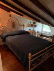 Villa Gemma : спальня с двуспальной кроватью
