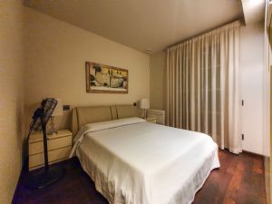Villa Patrizia : спальня с двуспальной кроватью