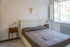 Villa La Perla : спальня с двуспальной кроватью