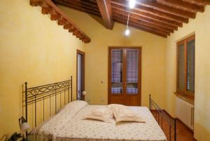 Rustico del Mare : спальня с двуспальной кроватью