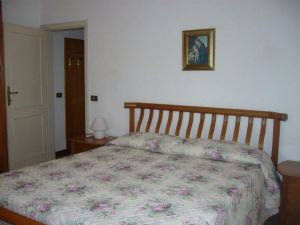 Villa Amanda : спальня с двуспальной кроватью