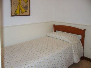 Villa Amanda : спальня с односпальной кроватью