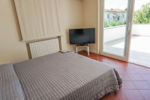 Villa Reggio : спальня с двуспальной кроватью
