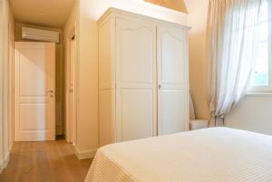Villa Lina : спальня с двуспальной кроватью