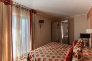 Appartamento Oasi : спальня с двуспальной кроватью