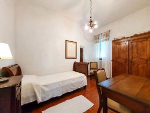 Villa Claudio  : спальня с односпальной кроватью