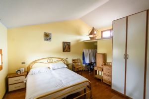 Villetta Romina : спальня с двуспальной кроватью
