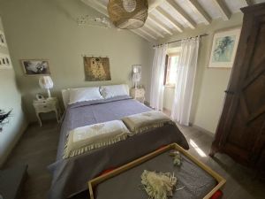 Villa Orfeo : спальня с двуспальной кроватью