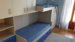 Villa Mare-Monti : спальня с двумя кроватями