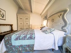 Villa Fiume : спальня с двуспальной кроватью