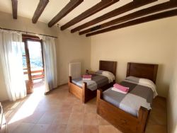 Villa Sol Levante : спальня с двумя кроватями