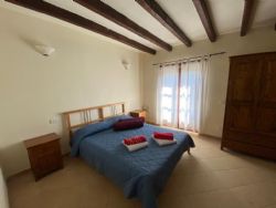 Villa Sol Levante : спальня с двуспальной кроватью
