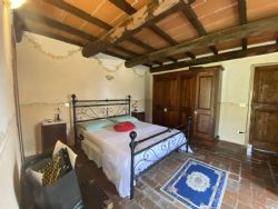 Villa dei Cerri : спальня с двуспальной кроватью