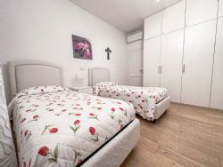 Villa Carmen : спальня с двумя кроватями