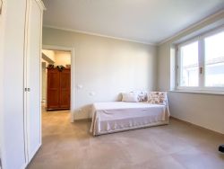 Villa Calacatta : спальня с двуспальной кроватью