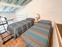 Villetta Dolce Vita : спальня с двумя кроватями