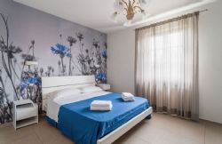 Villa La Campagnola : спальня с двуспальной кроватью