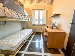 Appartamento Paradisiaco : спальня с двумя кроватями