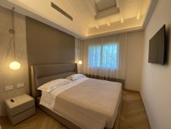 Appartamento Pinot Noir : спальня с двуспальной кроватью