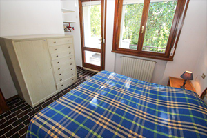 Villa Sabrina : спальня с двуспальной кроватью