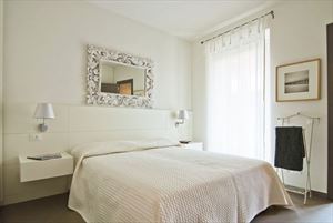 Appartamento Achille : спальня с двуспальной кроватью