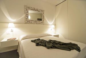 Appartamento Alessio : спальня с двуспальной кроватью