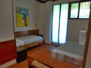 Villa Ronchi : спальня с односпальной кроватью