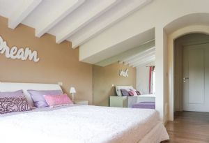 Villa Italia : спальня с двуспальной кроватью