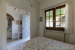 Villa Charme Toscana vista mare  : спальня с двуспальной кроватью