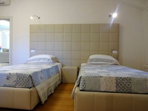 Appartamento Apollo : спальня с двумя кроватями
