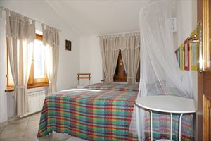 Villetta Federica : спальня с двумя кроватями
