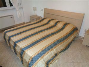 Appartamento Giardino : спальня с двуспальной кроватью