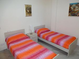 Villa Nuova   : спальня с двумя кроватями