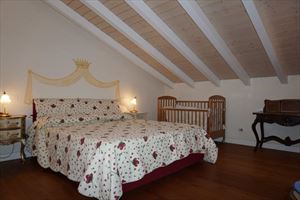 Villa Divina : спальня с двуспальной кроватью