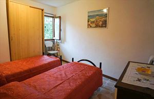 Villa Teresa : спальня с двумя кроватями