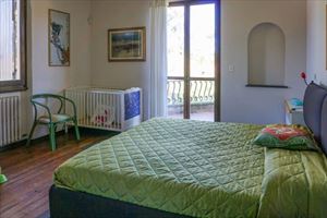 Villa Cristina : спальня с двуспальной кроватью
