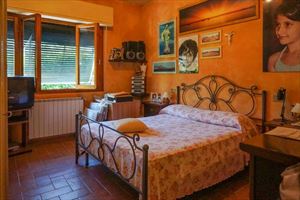 Villa Coriandolo : спальня с двуспальной кроватью