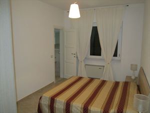 Appartamento    Forte  Sud  : спальня с двуспальной кроватью