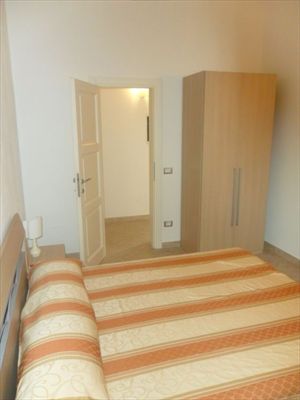 Appartamento Attico Nord : спальня с двуспальной кроватью