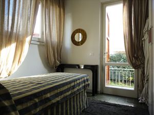 Villa Angelica : спальня с односпальной кроватью