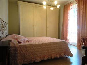 Villa Calipso : спальня с двуспальной кроватью