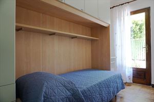 Villa Ilda : спальня с односпальной кроватью